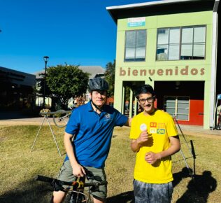 YMCA Ride4Refugee State Rep Wu congratulating Paarth