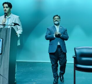 Addressing in Elkins Auditorium with Mayor Elackatt